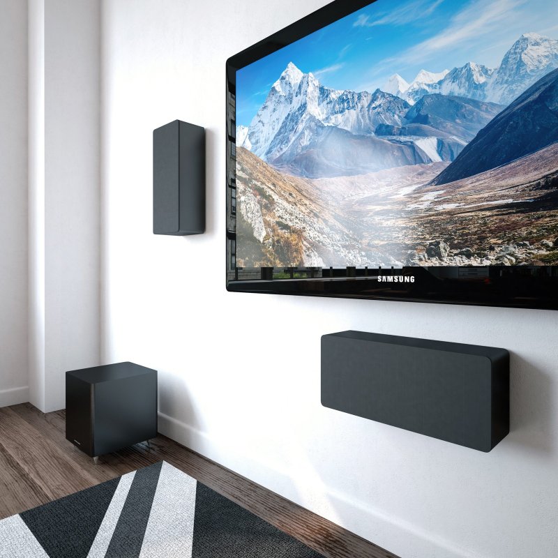 Acoustic Energy AE105 + AESub 2.1 Speaker Pack Black: two AE105 on-wall speakers and AE Sub subwoofer in a living room, grilles on