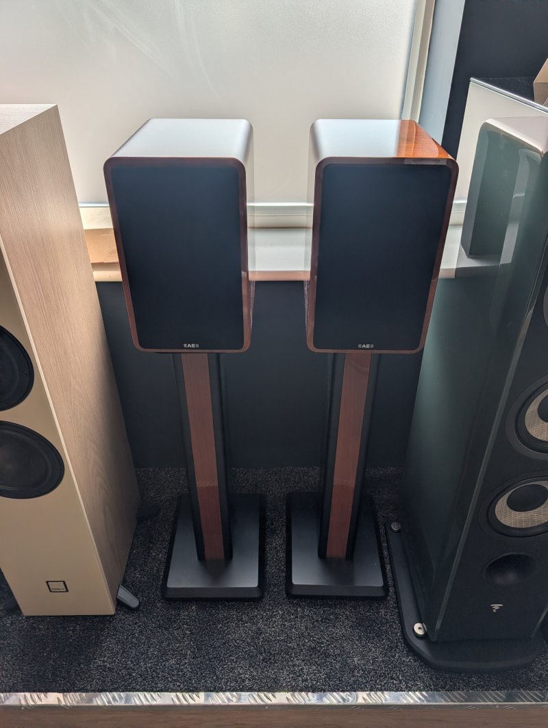 Acoustic Energy AE1 Active Speakers Piano Walnut Gloss (Pair) front with reference stands