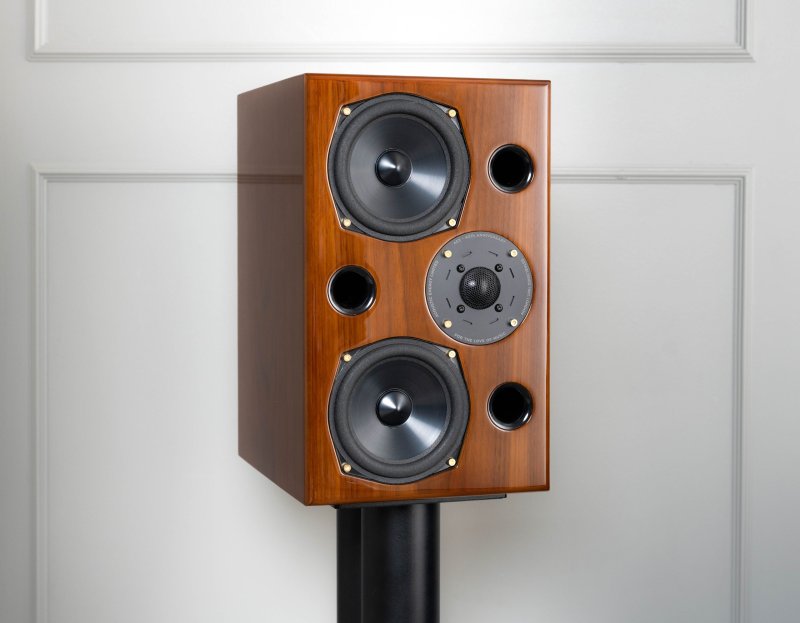 Acoustic Energy AE2 40th Anniversary in High Gloss Walnut on a stand, angled view, single speaker shown