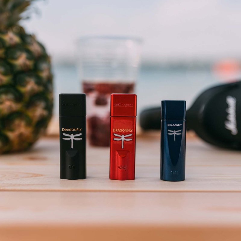 AudioQuest DragonFly family — Black, Red, and Cobalt side by side showing relative size