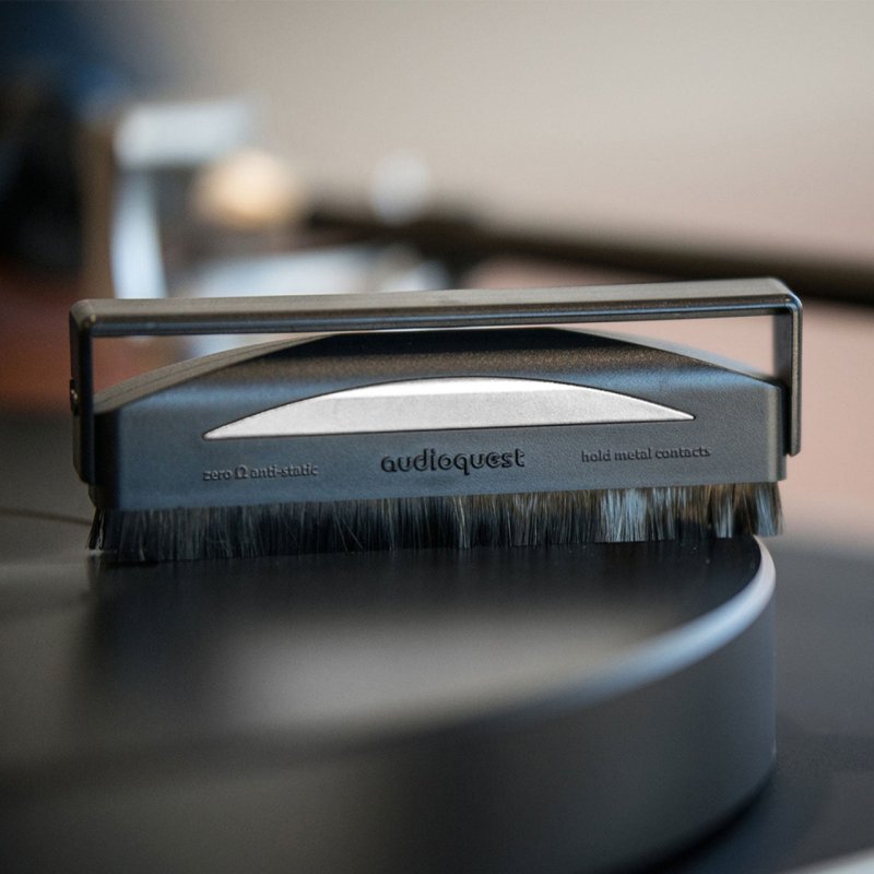 AudioQuest Silver Anti-Static Record Brush — resting on turntable platter