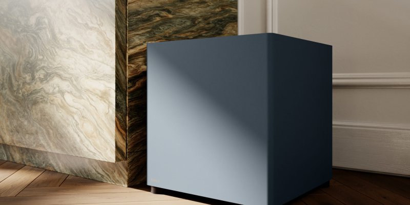 DALI BASIK SUB in Chilly Blue positioned beside fitted cabinetry