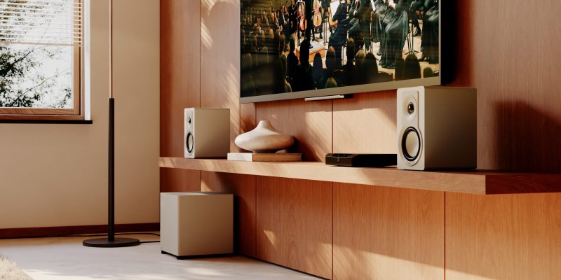 DALI BASIK SUB in Caramel White positioned beside fitted cabinetry