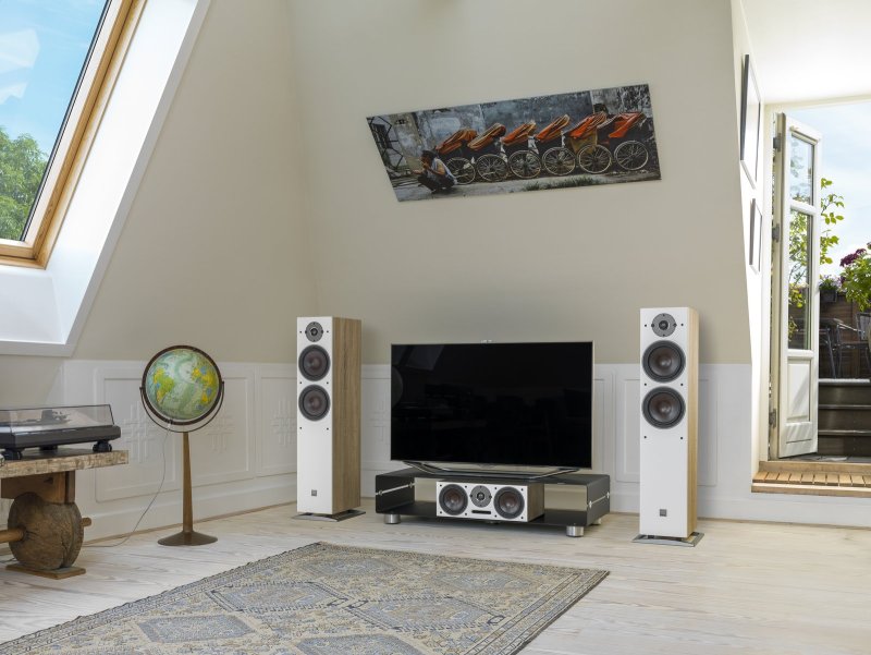 DALI Oberon 7 Light Oak speakers in a living room stereo system