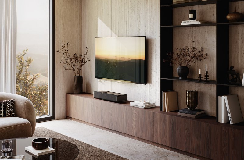 DALI VEGA Dark Oak on a media unit below a wall mounted television