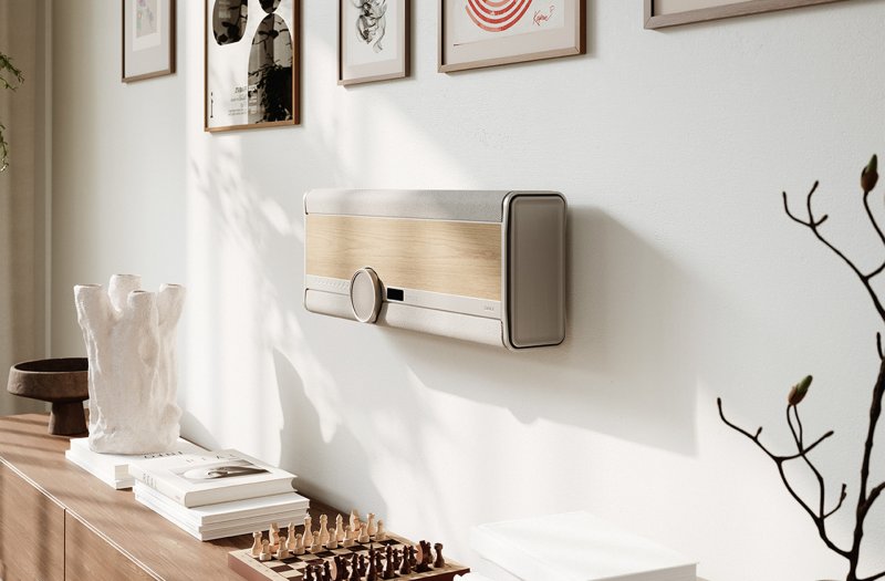 DALI VEGA Natural Oak wall mounted in landscape orientation above a sideboard