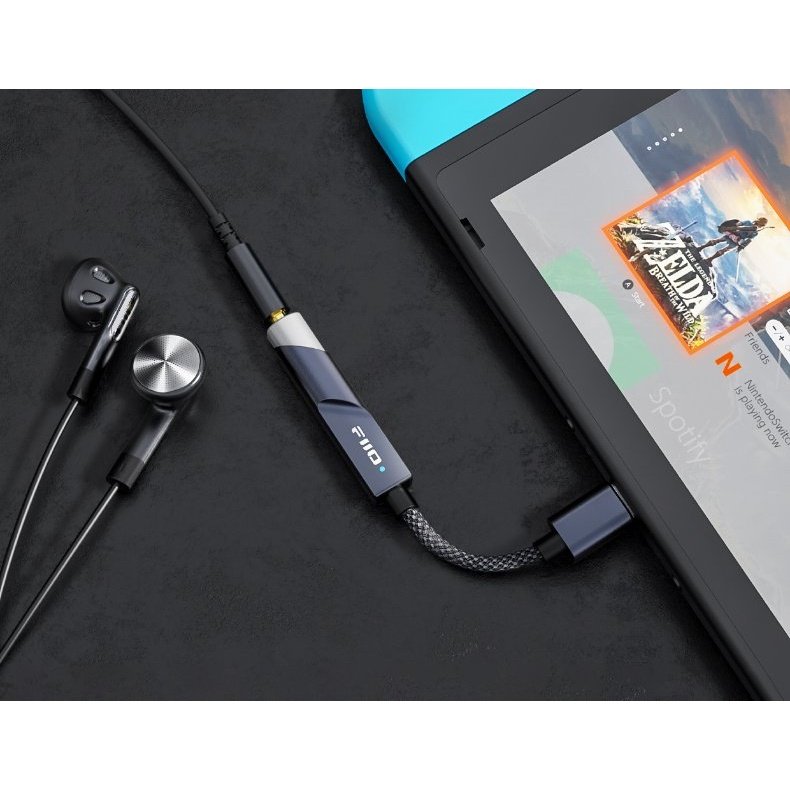 FiiO KA11 USB-C Black plugged into a Nintendo Switch with earphones