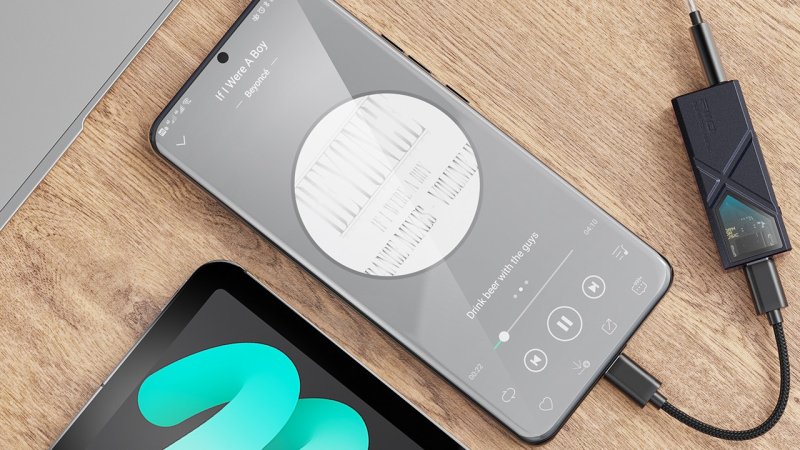 FiiO KA13 Portable Dual DAC/Headphone Amplifier connected to smartphone