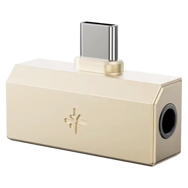 FiiO Tiny A Gold - angled view showing USB-C connector and 3.5mm headphone port