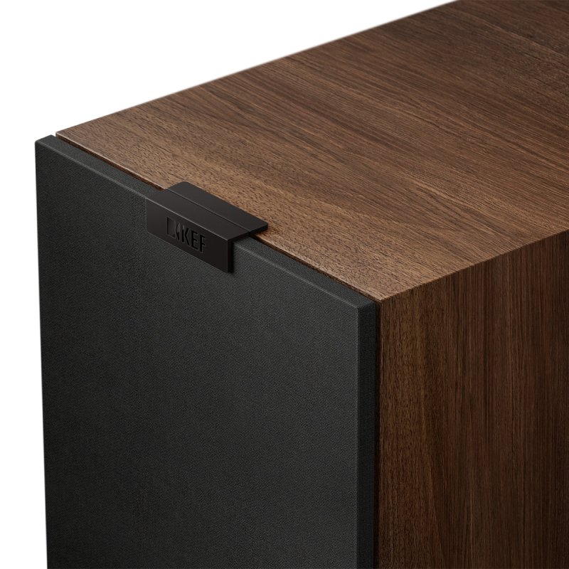 KEF Q Concerto Meta Standmount Speaker Walnut, close up of the magnetic grille and cabinet finish