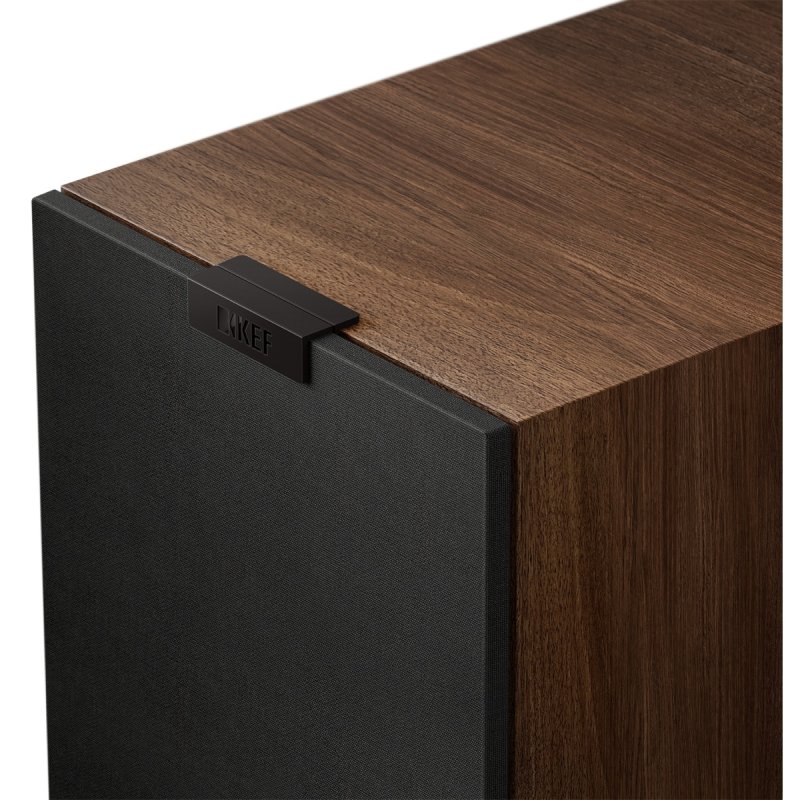 KEF Q1 Meta Bookshelf Speakers Walnut, close-up detail of cabinet corner with magnetic grille fitted