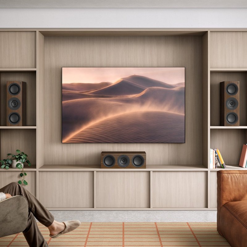 KEF Q6 Meta Centre Speaker in a living room, Walnut finish shown