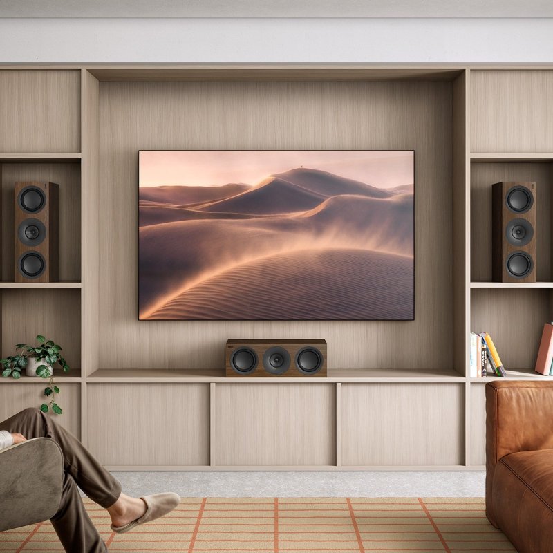 KEF Q6 Meta Centre Speaker in a living room, Walnut finish shown
