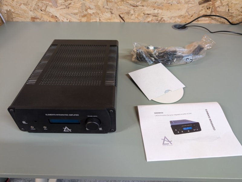 Leema Acoustics Elements Integrated Amplifier Black with other contents on desk