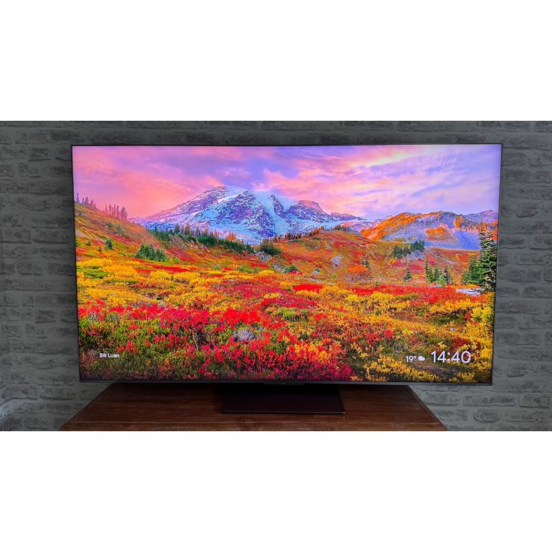 Loewe Bild i 55 OLED Television — lifestyle (with table stand, home setting)