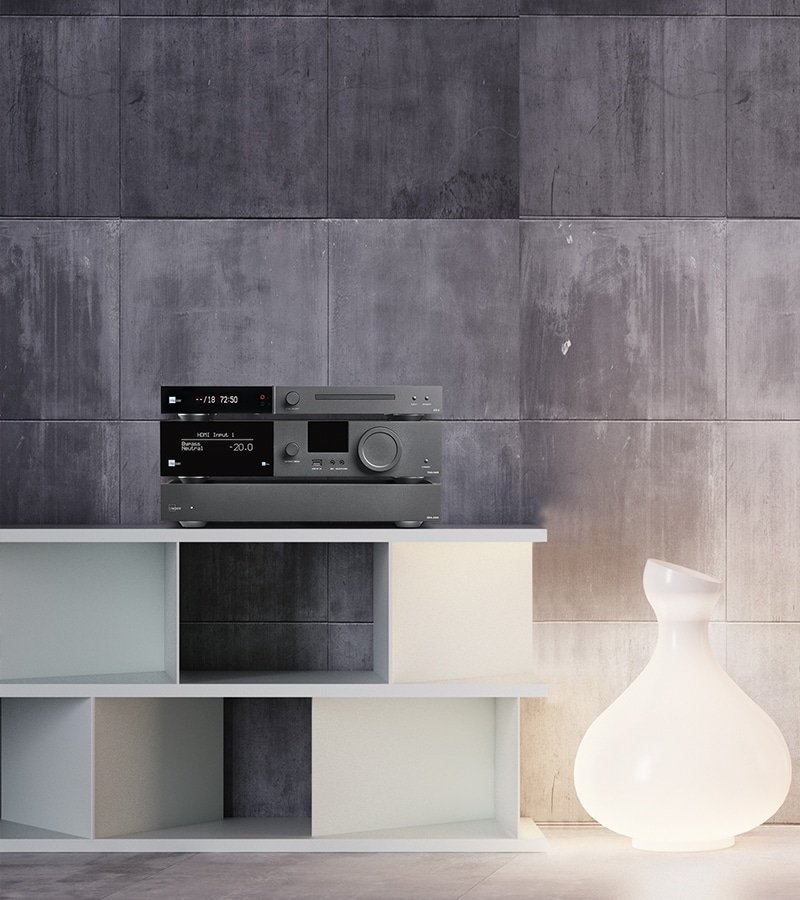 Lyngdorf CD-2 shown with Lyngdorf amplifier in a living room setting