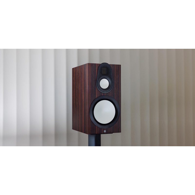 Monitor Audio Gold 100 6G Macassar on speaker stand in listening room setting