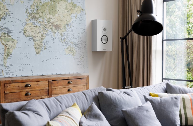 Monitor Audio Silver On-Wall 8G Satin White wall mounted in a living room