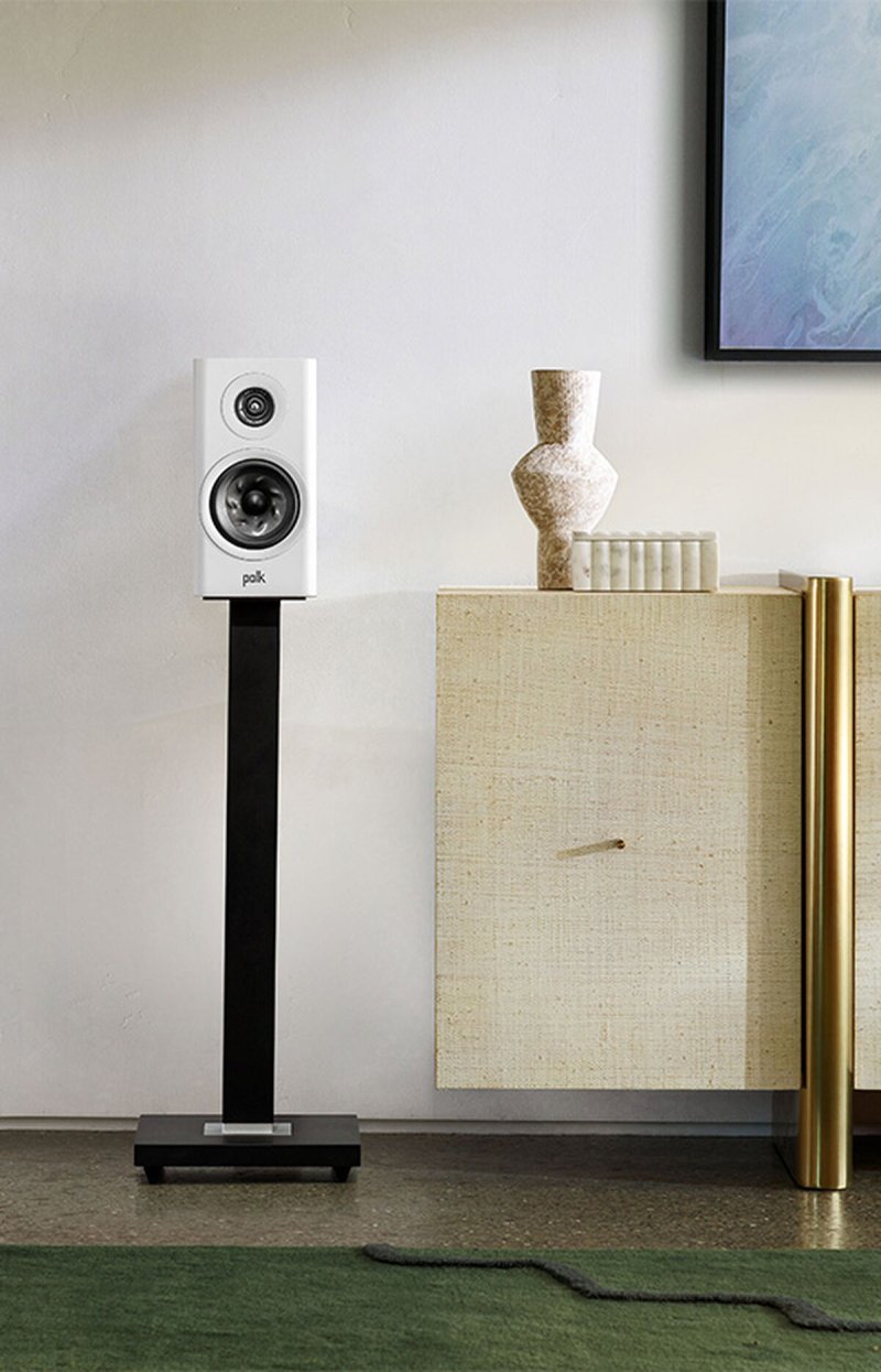 Polk Audio Reserve R100 Bookshelf Speakers White (Pair) — lifestyle on stand