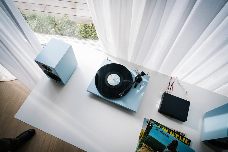 Pro-Ject Colourful Audio System 2 Steel Blue Satin — overhead view with vinyl