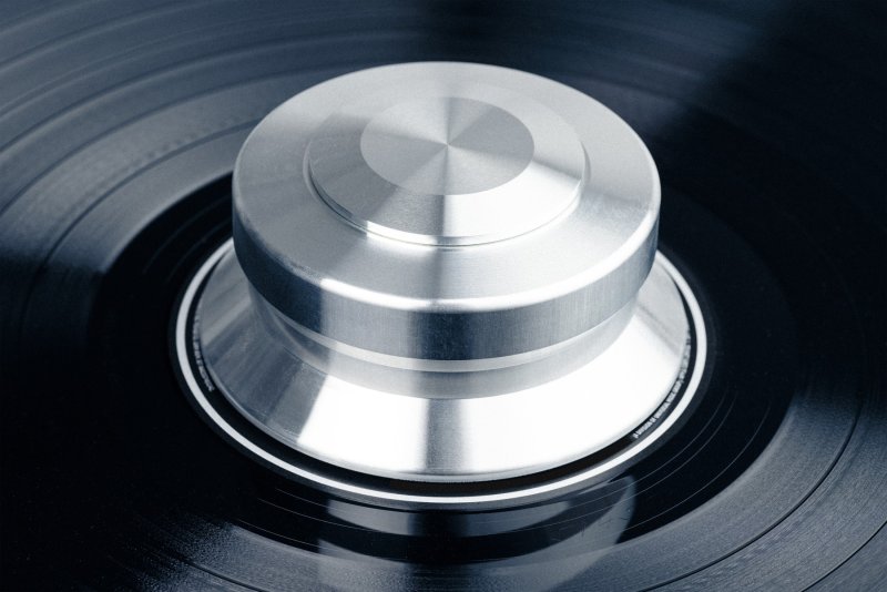 Pro-Ject Signature Record Puck in use on a vinyl record