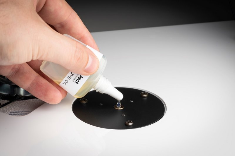 Pro-Ject Lube It being applied to turntable spindle bearing