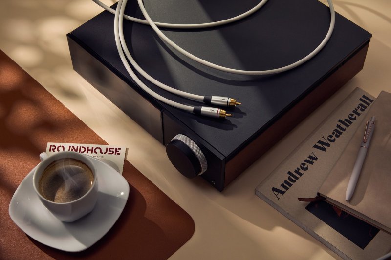 QED Performance Audio interconnect routed to an integrated amplifier