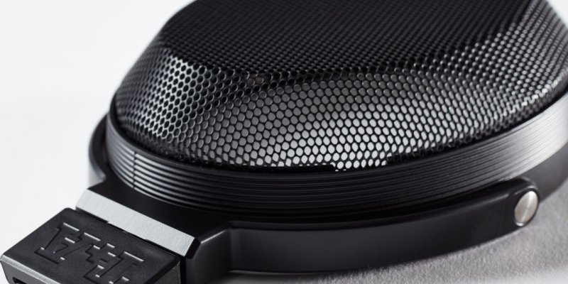 T+A Solitaire P-SE Planar Magnetic Headphones — ear cup grille close-up