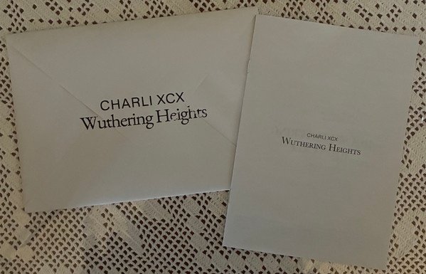 Lyric booklet and printed envelope included with the LP