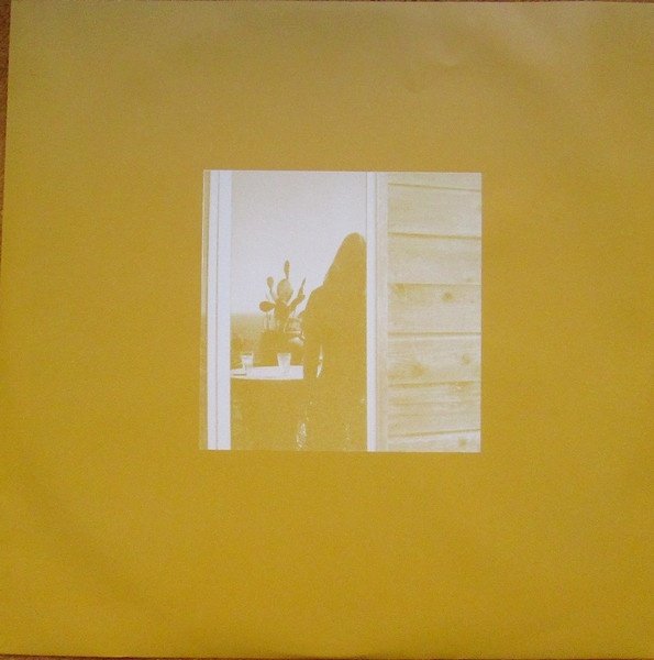 Reverse of the yellow printed inner sleeve