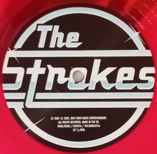 The Strokes - Is This It (LP) Vinyl, side A record label on transparent red vinyl