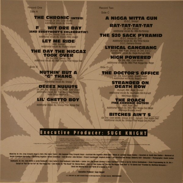 Inner artwork with the four side track listing and album credits