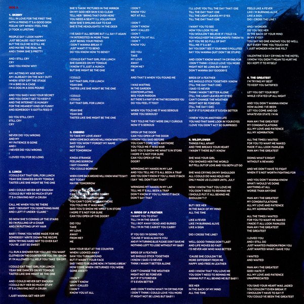 Printed inner sleeve with lyrics, side one