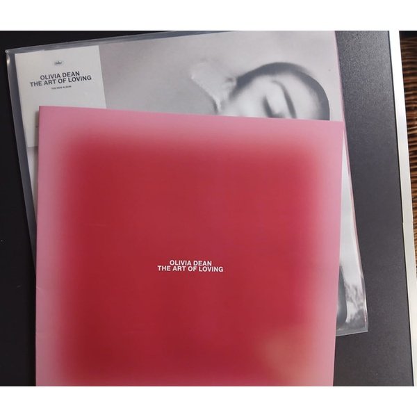 Included 14 page booklet alongside the album sleeve