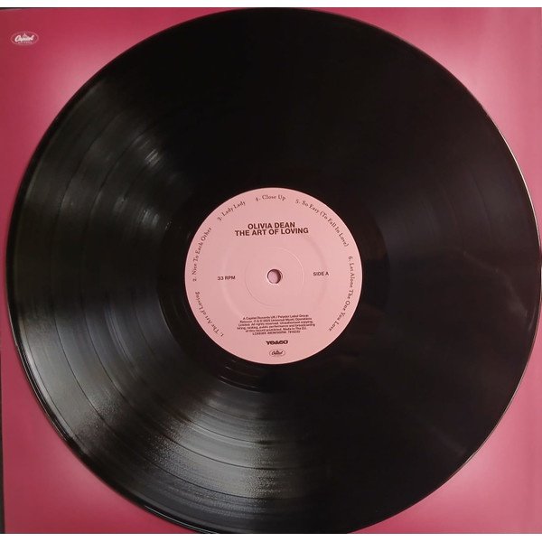 Black vinyl LP with the pink Capitol side A label